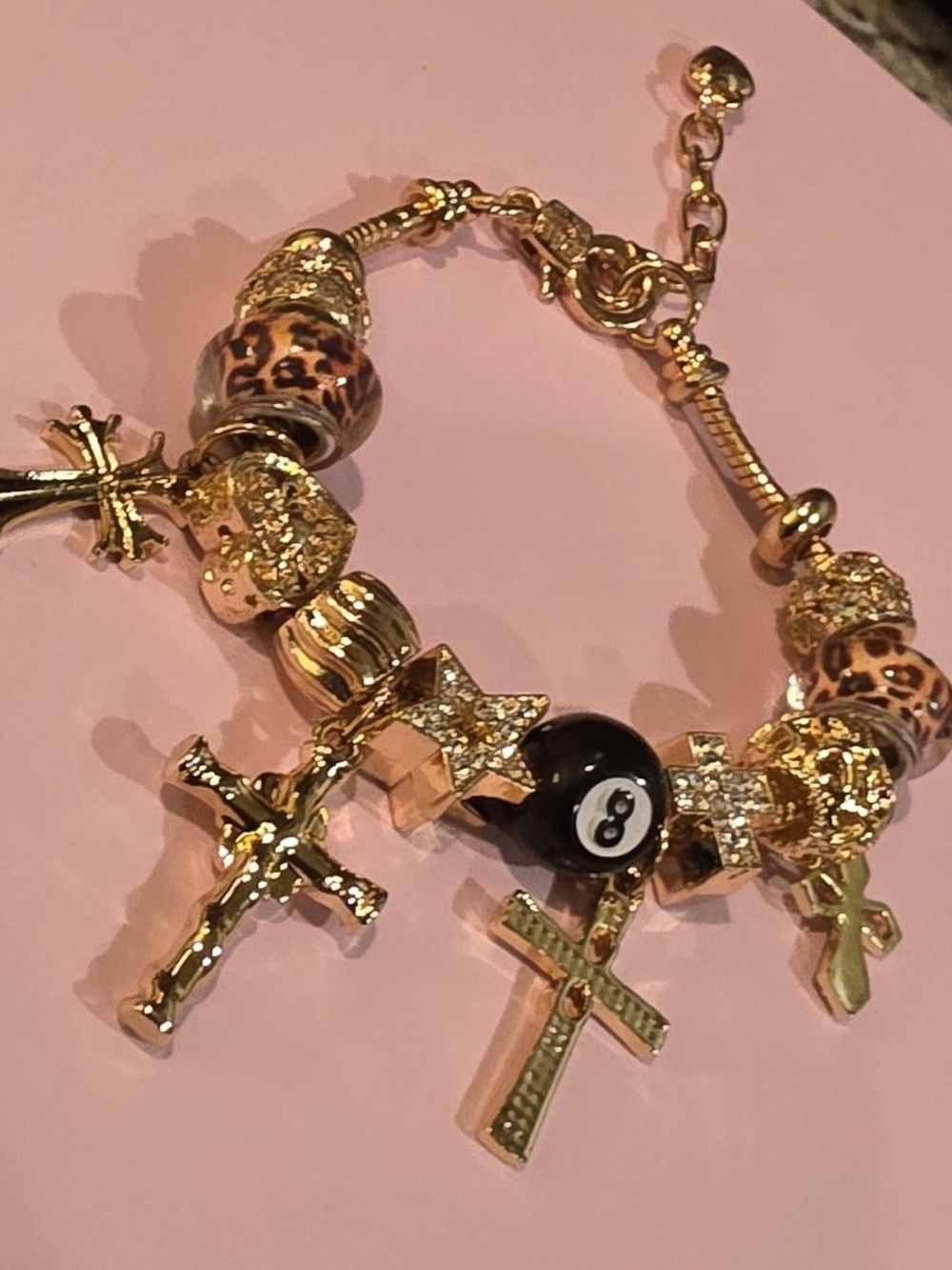 Source Unknown Gold Charm Bracelet with Leopard Beads and Black Accent
